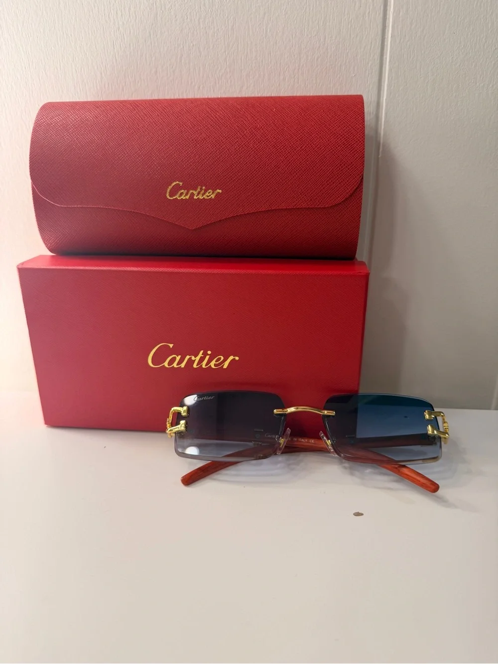 Cartier Men’s Rimless Sunglasses with Blue Gradient Lenses and Gold Accents